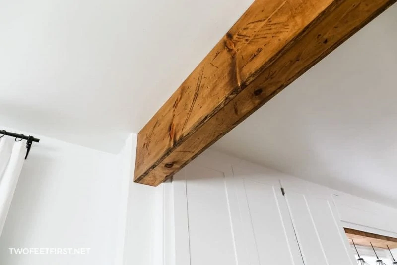 stain wood beam in home