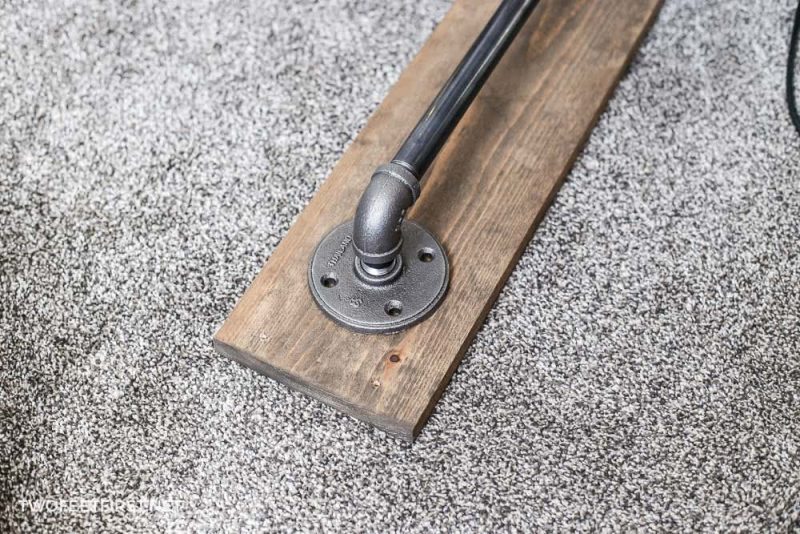 placing metal floor flange on wood