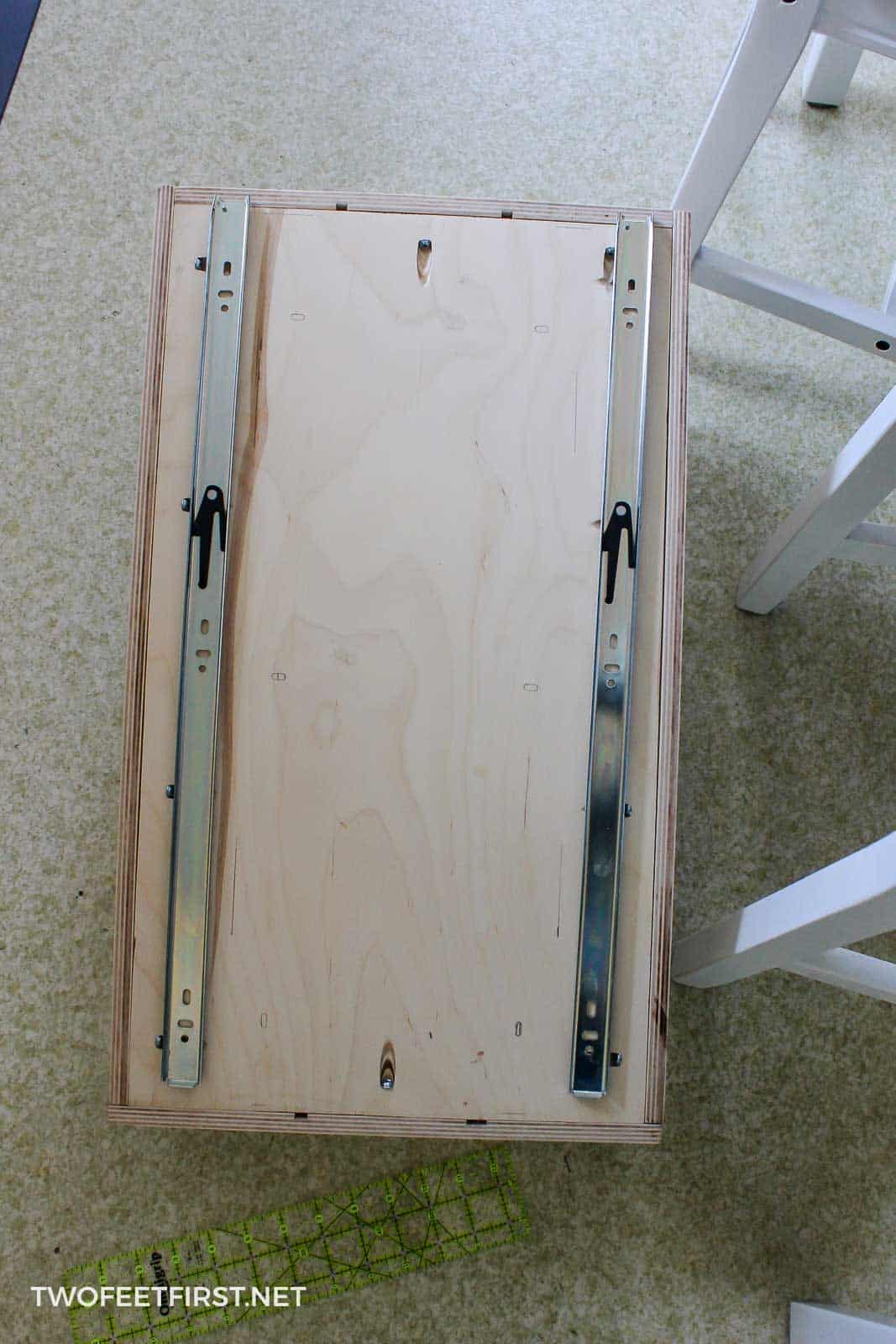 DIY pull out baking sheet drawer to organize cookie sheets