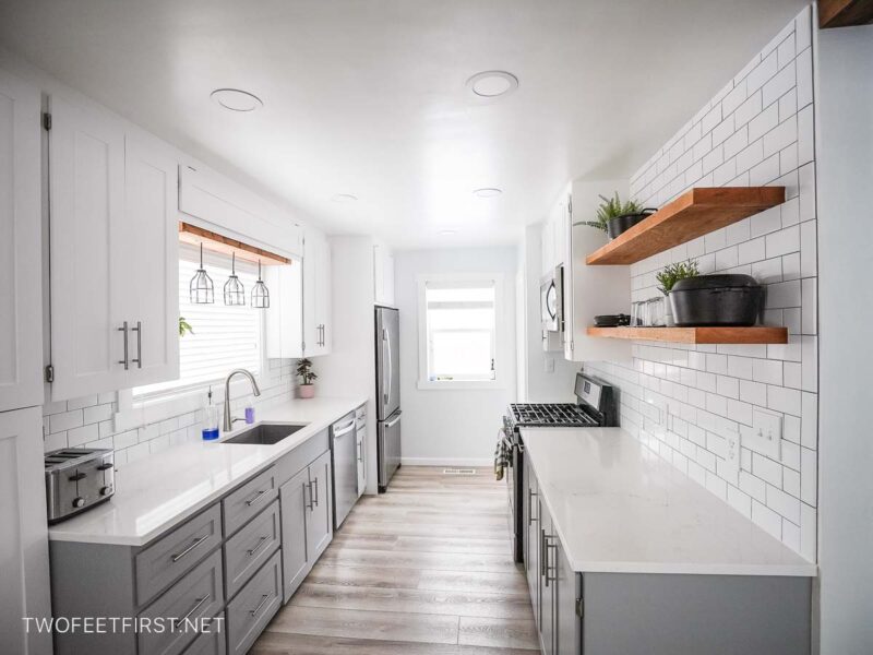 kitchen with subway tile backsplash and floating shelves