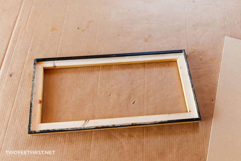 back of wooden frame with 3/8" dowels installed