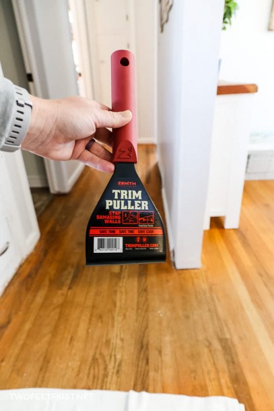 red and black trim puller