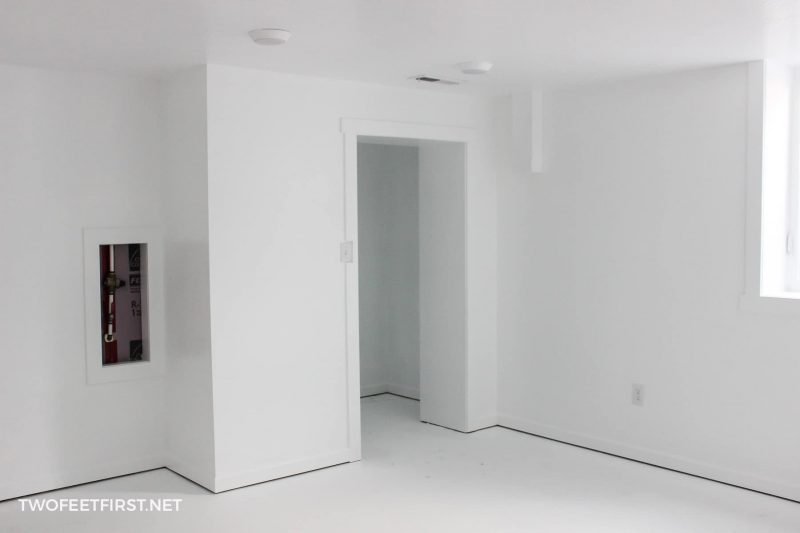 painted bedroom in basement white