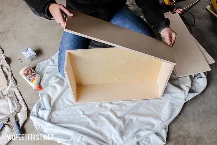 Do you want to organize a closet by adding drawers? Here is a DIY tutorial on how to build drawers for a closet system. PLUS see how to create a full closet system for a small closet. #twofeetfirst #diy #closet #organize #build How to build drawers for a closet system