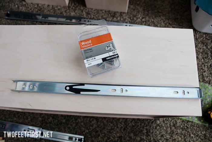 Do you want to organize a closet by adding drawers? Here is a DIY tutorial on how to build drawers for a closet system. PLUS see how to create a full closet system for a small closet. #twofeetfirst #diy #closet #organize #build DIY Closet System