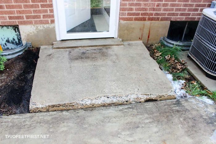 cleaning chipped concrete step before repair