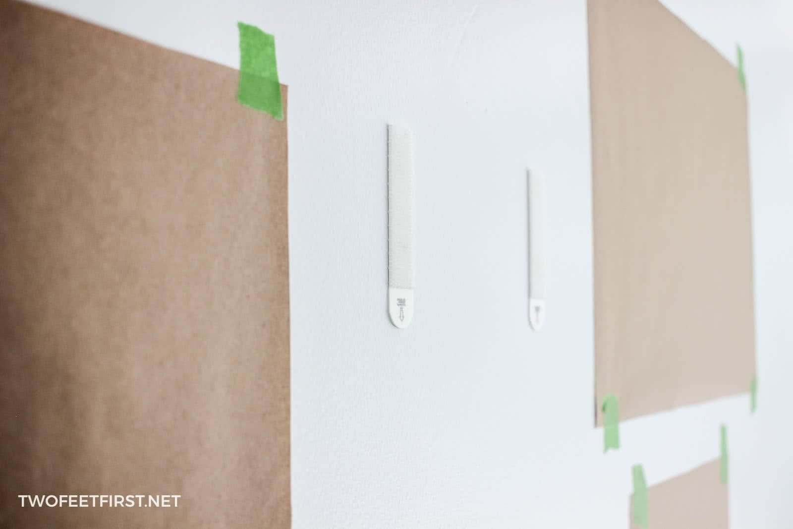 installing 3m Command picture strips to wall