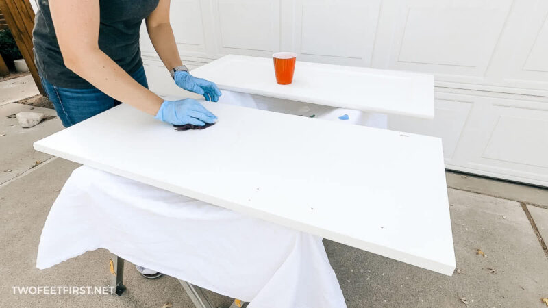 applying liquid sandpaper to cabinets
