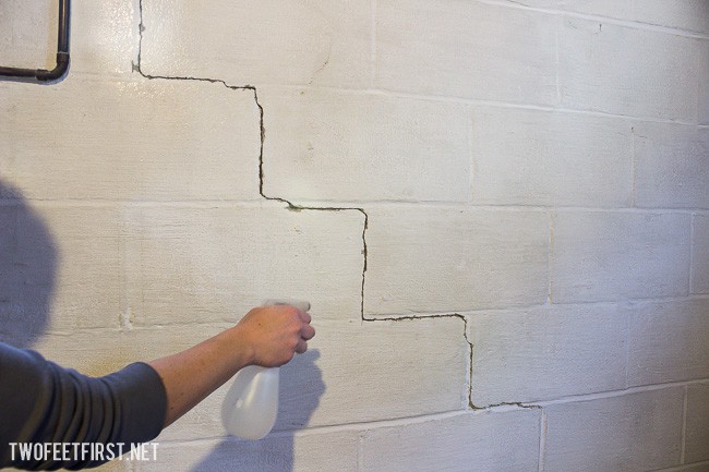 Waterproof foundation cracks by filling them in